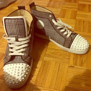 Christ Louboutin gently used sneaker/No box or bag